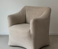 Curved Beige Fabric Armchair
